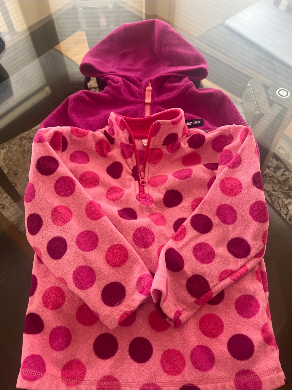 A bundle of fleece tops. Size 5. GUC